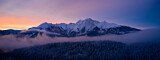 Image. Purple sky over snowy mountains